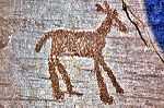 Rock drawing of warriors.