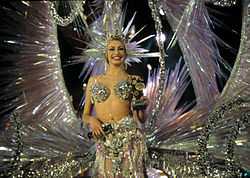 Smiling young woman in Carnival Queen costume