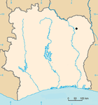 A blank map of a rectangular-looking country with three main rivers running through it. A location is marked in the north-east corner with a black dot.