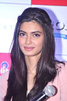 Diana Penty smiling at the camera