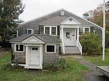 The Eastham Public Library with its playhouse miniature