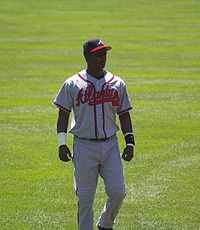 Photograph of Edgar Rentería standing on a baseball field while with the Atlanta Braves.