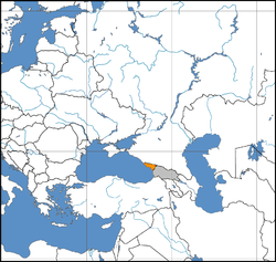 Map centred on the Caucasus indicating Abkhazia (orange)and Georgia proper (grey).