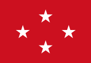 Red flag with four white five-point stars in a centered diamond arrangement