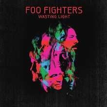 A collage of green, blue and pink face pictures of the Foo Fighters members against a black background. Above it is the title "FOO FIGHTERS - WASTING LIGHT" in red letters.
