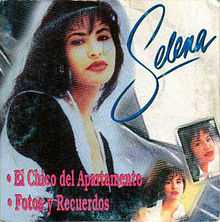 A cardboard box CD cover of a Latina woman looking outwards while posing.