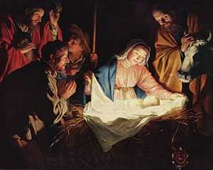 A Nativity scene; men and animals surround Mary and newborn Jesus, who are covered in light