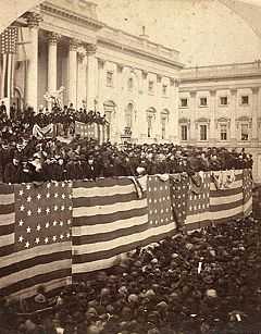 A large crowd of people outside the United States Capitol building