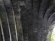 View of the intrados of the arch, looking upwards. The blue engineering bricks are stained white in part by minerals leached from the mortar, but in general the brickwork is in good condition.