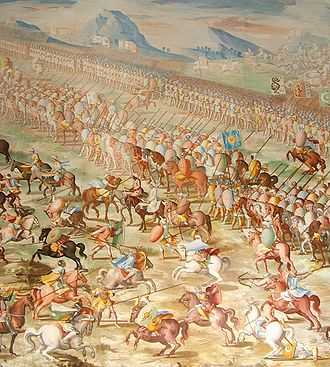 A painting of a battle with a long line of mounted riders side-by-side in front of a line of marching men. In front of the riders are a number of individual horsemen fighting.