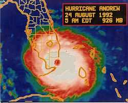 A satellite and map showing an intense hurricane striking South Florida