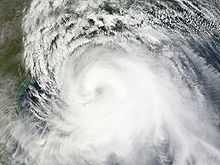Satellite image of a large tropical cyclone which has a developing eye feature