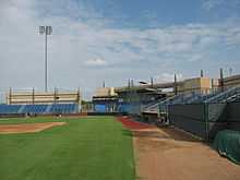 A The seats, press box and third base line of Clay Gould Ballpark