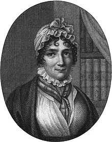 Engraving of woman, showing her head and shoulders. She is wearing 19th-century clothing and a white cap. A bookshelf is in the background.