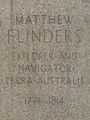 J150W-statue-Flinders-base-text.jpg