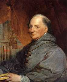 A painting of an elderly, balding, priest wearing a gray robe and a large cross necklace sits, facing left, in front of a brown curtain and bookshelf.