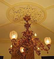 Four-tier brass Victorian chandelier in the John Thompson House.