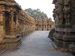 precinct of a temple with sculptures on either side