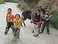 Kids on the road to the Garze Gompa above Ganzi.jpg