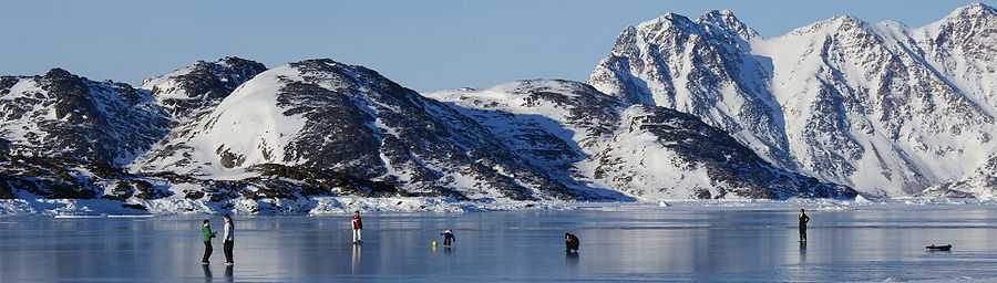 Children of Kulusuk play on the frozen sea