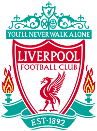 The words "Liverpool Football Club" are in the centre of a pennant, with flames either side. The words "You'll Never Walk Alone" adorn the top of the emblem in a green design, "EST 1892" is at the bottom.