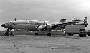 a large aircraft on an airport apron