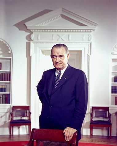 Lyndon B. Johnson, photo portrait, leaning on chair, color.jpg