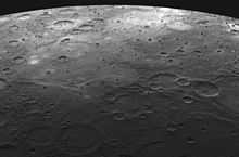 Lava-flooded craters and large expanses of smooth volcanic plains on Mercury.