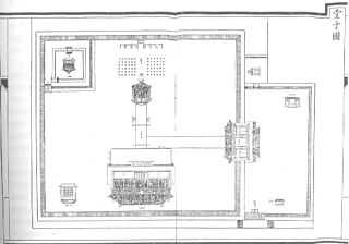 A black and white schematic map showing a square courtyard with a rectangular courtyard to its right. The buildings face the direction from which one was supposed to enter it, so some buildings appear upside down or oriented sideways.