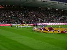 Maribor and Birmingham City players lineup moments before the start of their 2011–12 Europa League match.