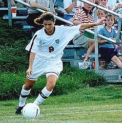 Mia Hamm takes corner kick.