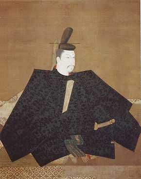 Portrait in three-quarter view of a person seated on the floor in courtly attire carrying a stick like object.