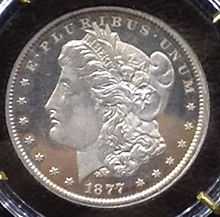 A coin depicting the profile of a young woman