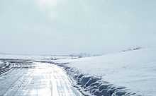 A photograph of the highway taken in May 2002 near the city of Nome in Alaska.