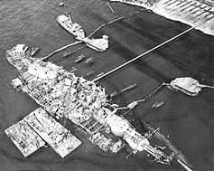 20 September 1943, Oklahoma fully righted, prior to refloating.