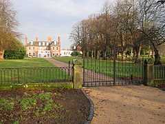 View of the hall and drive from outside the iron gates