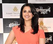 Parineeti Chopra is smiling at the cameraa