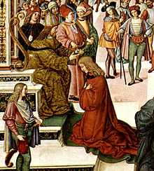 A bearded man sitting on a throne puts a laurel wreath on the head of a younger man who is kneeling before the throne