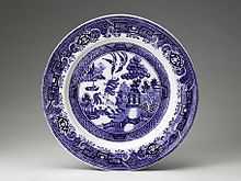 A Photo of a plate with a blue willow pattern like Janey Larkin had.