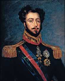 Half-length painted portrait of a brown-haired man with mustache and beard, wearing a uniform with gold epaulettes and the Order of the Golden Fleece on a red ribbon around his neck and a striped sash of office across his chest
