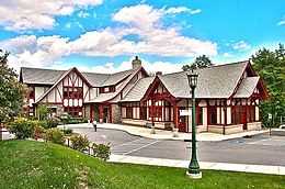 A single-story Tudor Revival-style library