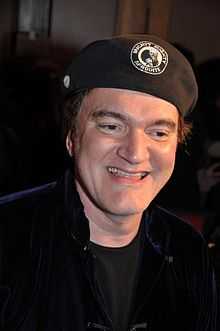 Photo of Quentin Tarantino arriving at the Django Unchained premiere in France in 2013.