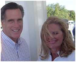 Casual photograph of Mitt and Ann Romney outdoors with wind blowing her hair