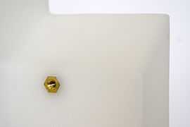 A brass threaded hex insert can be molded into plastic parts.