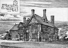 A two-storey timber-framed house with gables, dormers and tall chimney stacks. Inset in the top left corner of the drawing is a plan of the ground floor.
