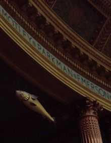  A view of the rear of the Massachusetts House of Representatives chamber, showing the Sacred Cod suspended above the railings of the visitors' gallery