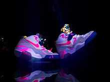 A pair of pink, neon sneakers