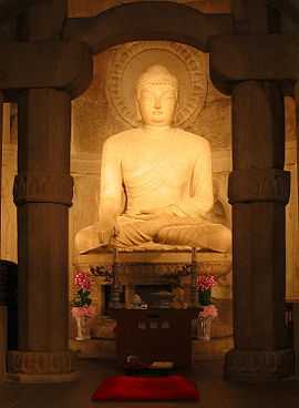 Figure of a seated buddha.