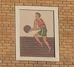 Terra cotta image of a basketball player