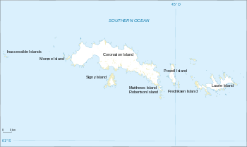  Outline map of a group of irregular-shaped islands the largest of which is labelled "Coronation Island". Laurie Island is shown at the eastern (right) end of the group.